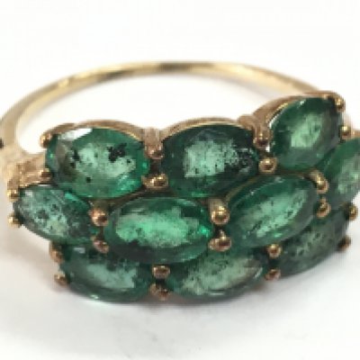 A 9 carat gold green stone ring, 3.1g total weight. Size S . Postage category A