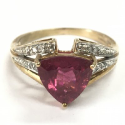 A 9 carat gold ruby and small diamond stone set ring , 3.4g total weight. Postage category A