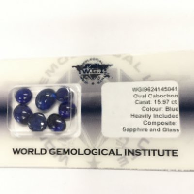 A certified security sealed parcel of 7 cabochon glass filled sapphire totalling 15.97ct. Postage B