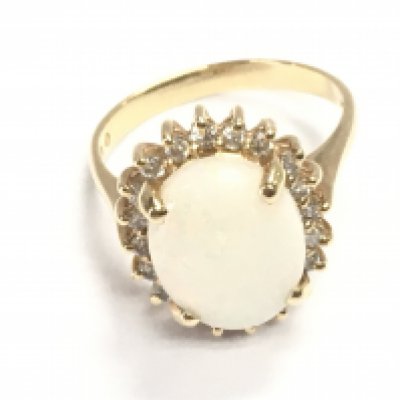 Traditional style 14ct yellow gold cluster ring set with an oval cabochon white opal surrounded by a halo of RBC diamonds. Approximately 2ct opal and 0.20ct diamonds. Size m 1/2