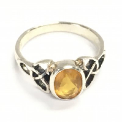 A silver Celtic style yellow and white CZ ring size N Postage A