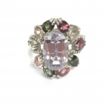 Large silver dress ring set with a central mixed cut spodumene with surrounding multi coloured tourmalines and diamonds. Spodumene 8.25ct tourmalines 4.25ct and 0.31ct diamonds. Size N