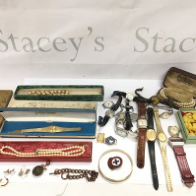 A collection of assorted costume jewellery including watches. Postage B