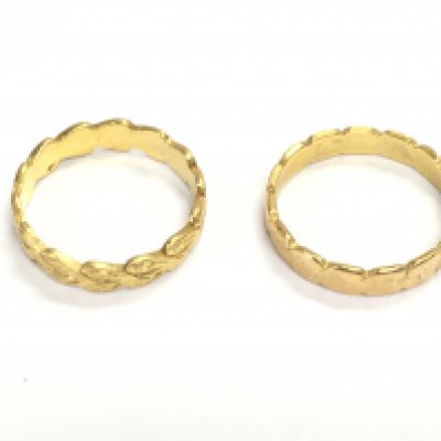 Two 22ct gold bands. 5.61g Postage A