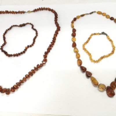 A collection of amber jewellery including necklaces and bracelet. Postage B