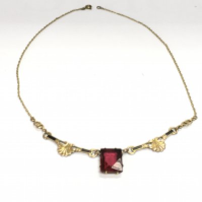 A gilt metal mourning necklace. Postage B