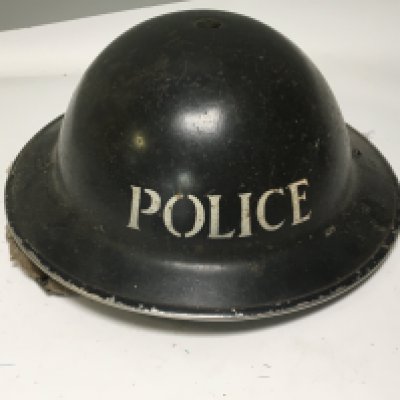 A II world war British civilian police issue steel helmet. With liner.