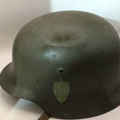 A very good example of a Norwegian II world war M38 pattern helmet with double Norwegian crest decal with leather liner.