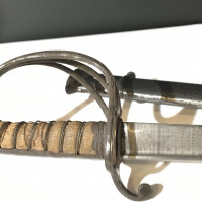 A Victorian officers sword with three bar guard wired grip the blade with makers name Hamburger &Co 30 Kings st London and with Royal Crown patterned on both sides the blade in very good condition. Steel scabbard