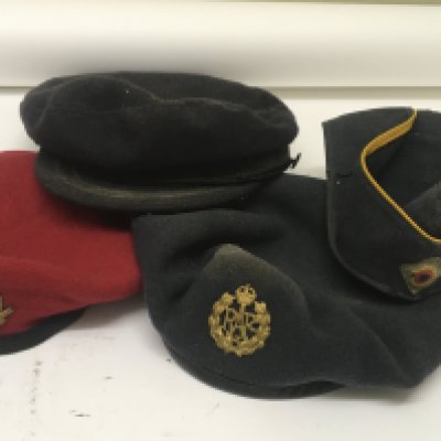 A German Luftwaffe cloth cap A British Military Police cap RAF cap and one other (4) NO RESERVE