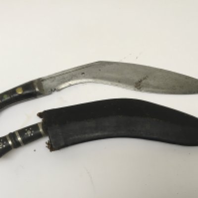 Two Kukri knifes the National weapon of Napul one without a scabbard. (2) NO RESERVE