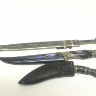 A Middle Eastern dagger with fillagree metal decoration an American Eagle knife and a small Kukri knife (3) NO RESERVE