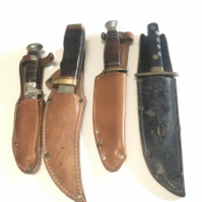 A collection of four Vintage Hunting Knifes Joseph Rodgers Sheffield Richards Sheffield and two others (4)