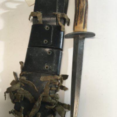 An interesting fighting Knife with a horn handle and leather bound scabbard possible Burmese Chindit Special Ops knife used between 1943-1944