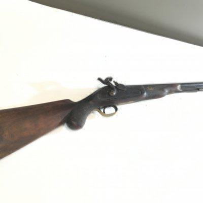 A 19th century Muzzle load Percussion sporting Rifle with brass fittings no obvious makers marks steel ram rod.