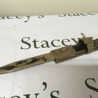 A Very good Example of a German Third Reich Afrika Korps bayonet with attached woven frog. the top side of the bayonet with Afrika Corps stamp the bayonet blade double sided number4874 m and Wasw stamped the metal scabbard and top grip painted in desert colour