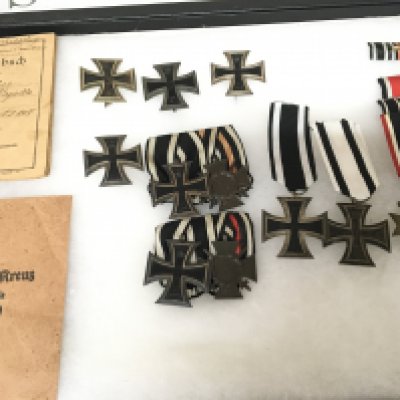 A collection of German Imperial I world war medals and award badges Iron cross second class war merit medals and Honour Cross most are authentic two badges possible reproduction please satisfy yourself before you bid. Sold with German soldiers service book p.