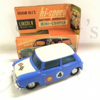 A Boxed Lincoln International Graham Hills Battery Operated Mini-Cooper. Box Is Worn Battery Cover Missing.