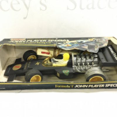 A Boxed Bradgate Lotus/Ford Formula 1 John Player Special Remote Control Racing Car. Box Is worn.