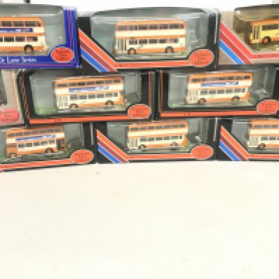 A box containing a collection of Exclusive First edition busses.