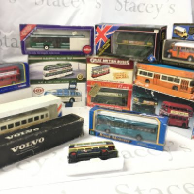 A collection of boxed diecast buses and trams by a variety of manufacturers including Corgi..Dinky ..Solido etc. No reserve