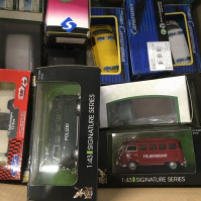 A box containing an assortment of boxed model vehicles mainly Volkswagen. No reserve.