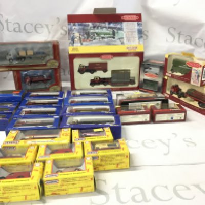 A collection of boxed model diecast model vehicles by Corgi..Lledo etc. includes models from the trackside series 00 gauge. No reserve