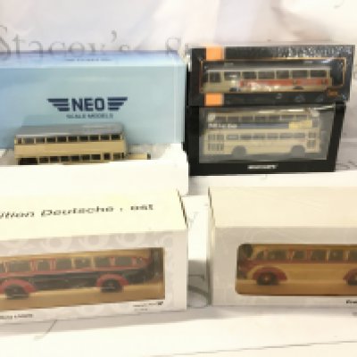 A Collection of 5 boxed diecast model buses. Manufacturers include NEO..Minichamps..ixo etc. No reserve