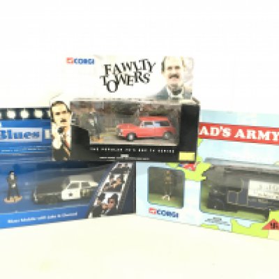 A Boxed Corgi Blues Brothers Mobile. A Dads Army Butcher Van And A Fawlty Towers Austin 1300 Estate.