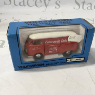A boxed Volkswagen model van by Kado in exclusive Coca Cola livery. No reserve