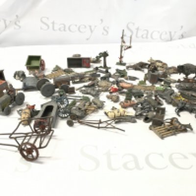 A collection of metal and lead toys primarily farm related equipment and animals. No reserve