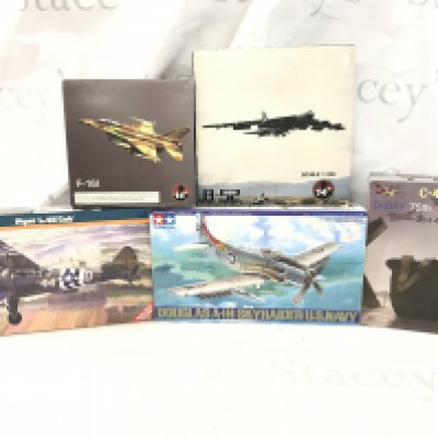 A box containing a quantity of model planes. No Reserve