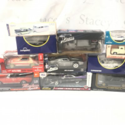 A box containing various model cars as pictured. No Reserve.
