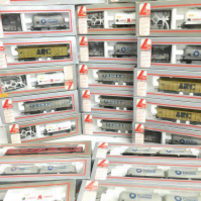 A Collection Of Boxed Lima 00 Gauge Wagons. Coaches Etc.