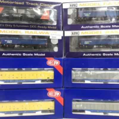A Collection Of Boxed 00 Gauge Rolling Stock by Dapol And Heljan. Including A Track Cleaner.