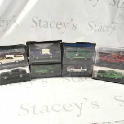 A collection of mostly unopened boxed diecast model cars by various manufacturers featuring American cars. No reserve.