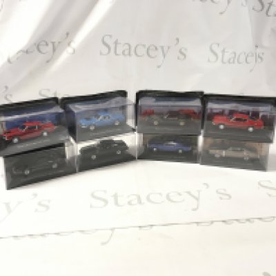 A collection of mostly unopened boxed diecast model cars by various manufacturers featuring American cars. No reserve