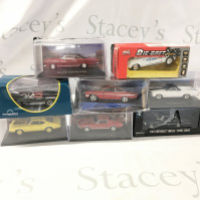 A collection of boxed diecast model vehicles by various manufacturers featuring American cars. No reserve