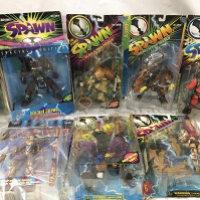A Collection of 8 Carded Spawn Figures. No Reserve.