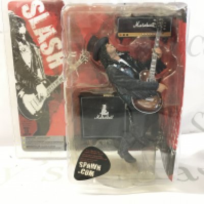 A sealed unopened Slash action figure by McFarlane TOS.