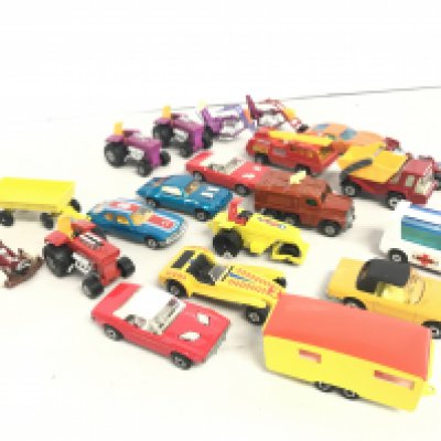 A Collection of 21 Matchbox 1-75 Series. Including 12 Superfast Models And A Rare Orange And Yellow Trailer Caravan.