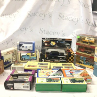 A collection in excess of 20 boxed diecast model cars mostly by Corgi in assorted series. Also includes boxed 3 function radio controlled 57 Chevy.
