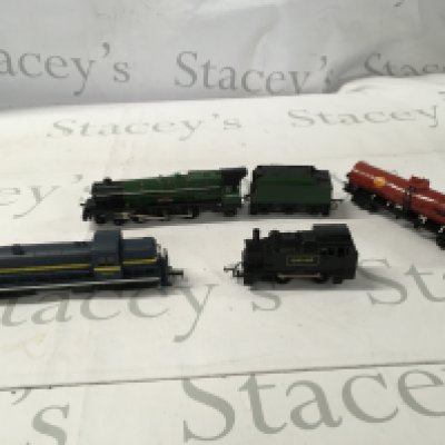 A small collection of 3 model locomotives a tender and a petrol tanker all 00 gauge. Plus a Corgi diecast model locomotive.No reserve
