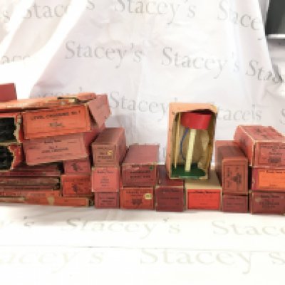 A collection of boxed 0 gauge model railway comprising track and running stock.