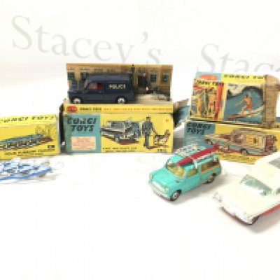 A Collection Of 4 Boxed Corgi Vehicles. A Four Four Plough #61. A B.M.C. Mini Police Van With Tracker Dog #458 (lead Broken) A Surfing B.M.C. Mini Countryman #485 And A Kennel Service Wagon #486. All Boxes Are Worn Etc.