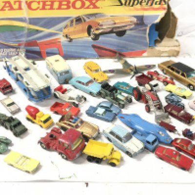 A Collection Of Playworn Diecast including Matchbox. Corgi And Dinky. A Matchbox SF-3 Curve And Space Leap Set. And A Marx Tinplate Racing Set. No Reserve.