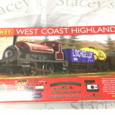 A Boxed Hornby 00 Gauge West Coast Highlander Set #R1157. Parts Missing.