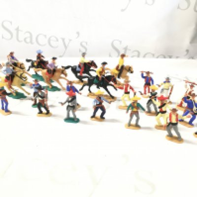 A Box Containing Timpo Cowboys And Mexicans.