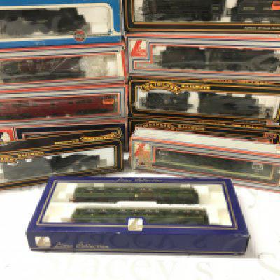 A Collection of 11 Boxed 00 Gauge Locomotives Including Lima And Mainline.