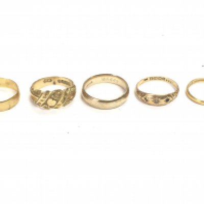 A Collection of gold rings including two 22ct wedding bands , a 9ct wedding band and 18ct rings. Total weight 19.2g. Postage category A